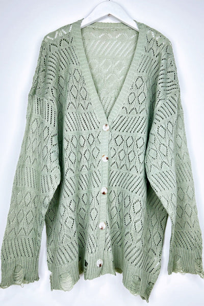 Vintage Cozy: Retro Frayed Hem Diamond Knit Pullover